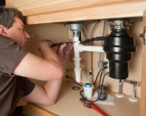 how to fix a leaking garbage disposal from the bottom