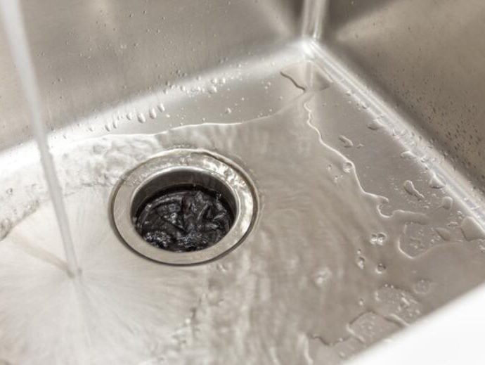 sink only drains when garbage disposal is on